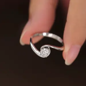 A ring set with CZ diamonds is suitable for jewelry in proposal and wedding scenes ring jewelry