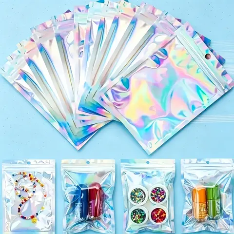 100Pcs Holographic Aluminum Foil Ziplock Bags with Clear Window, Laser Rainbow Resealable Pouches, Zipper Bag for Badges, Cosmetics, Jewelry, Small Business Supplies, Perfect Packaging for Teachers' Day, Halloween, Thanksgiving, Christmas & New Year Gifts