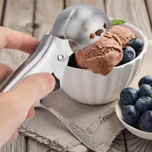 1Pc Stainless Steel Ice Cream Scoop with trigger release, doubles as melon ball and dough scoop. Durable & reusable, perfect for home kitchens, dorms, weddings, parties and restaurant use.
