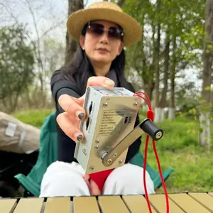 Multi-functional emergency charger | Hand-cranked generator, safe and portable, integrating charging, electronic ignition, tri-band radio, and three-level lighting functions, suitable for outdoor camping, hiking, and wilderness survival challenges.