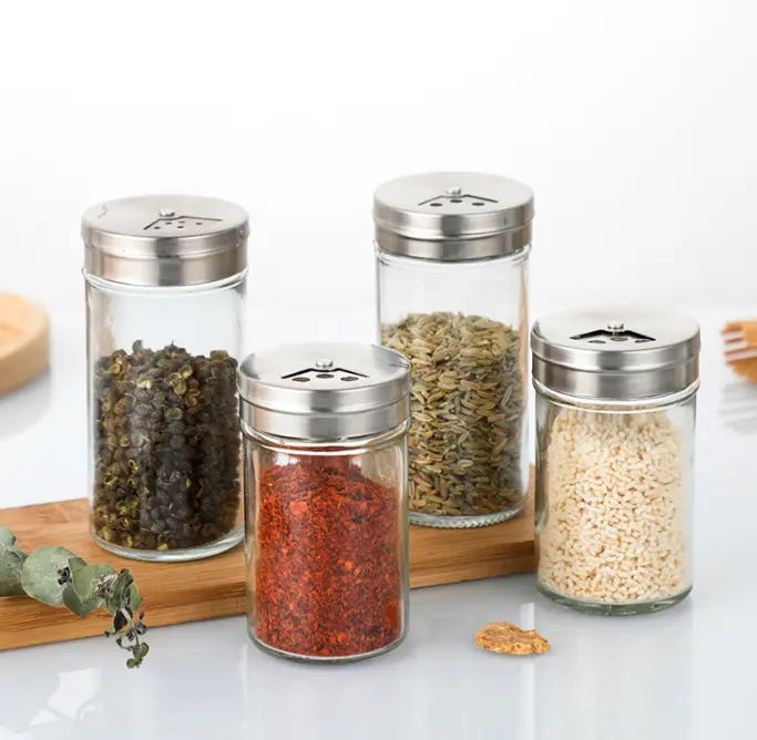 Transparent seasoning storage jars featuring twist metal tops with adjustable pouring holes, airtight design keeps dried spices fresh and lets you quickly identify every condiment inside
