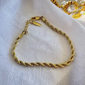 Gold-Tone Twisted Rope Bracelet with Secure Clasp for Everyday Elegance