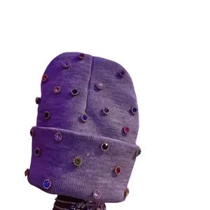 Light Grey Beanie with Decorative Accents and Colorful Embellishments