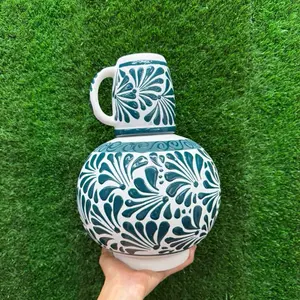 Botellón Relieve (Cielito Lindo) 3.5lt color Verde Pavo.