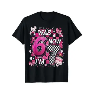 Kids Boys Girls 7th Birthday T-Shirt - "I Was 6 Now I'm 7" Pink Checkered Age 7 Number 7 Print - Soft Breathable Cotton Preshrunk Jersey Round Neck Tee for 7 Year Birthday Outfit for Boys & Girls 7 Years (3-13Y)