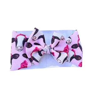 Cow Wearing Top Knot Headwrap Bow