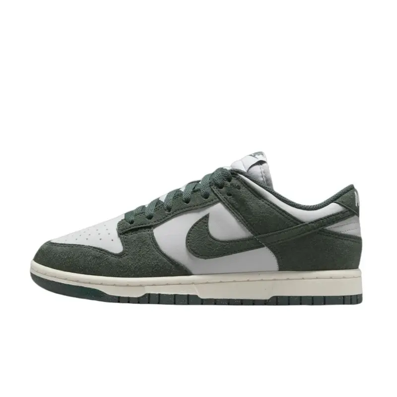 Women's Nike Dunk Low Next Nature Vintage Green Low-Cut Sneakers - Recycled Eco-Minded Construction, Heritage Design Cues, Cushioned Midsole, Durable Rubber Outsole, Colorblock Contrast Green Overlays Add Depth, Daily Casual Footwear