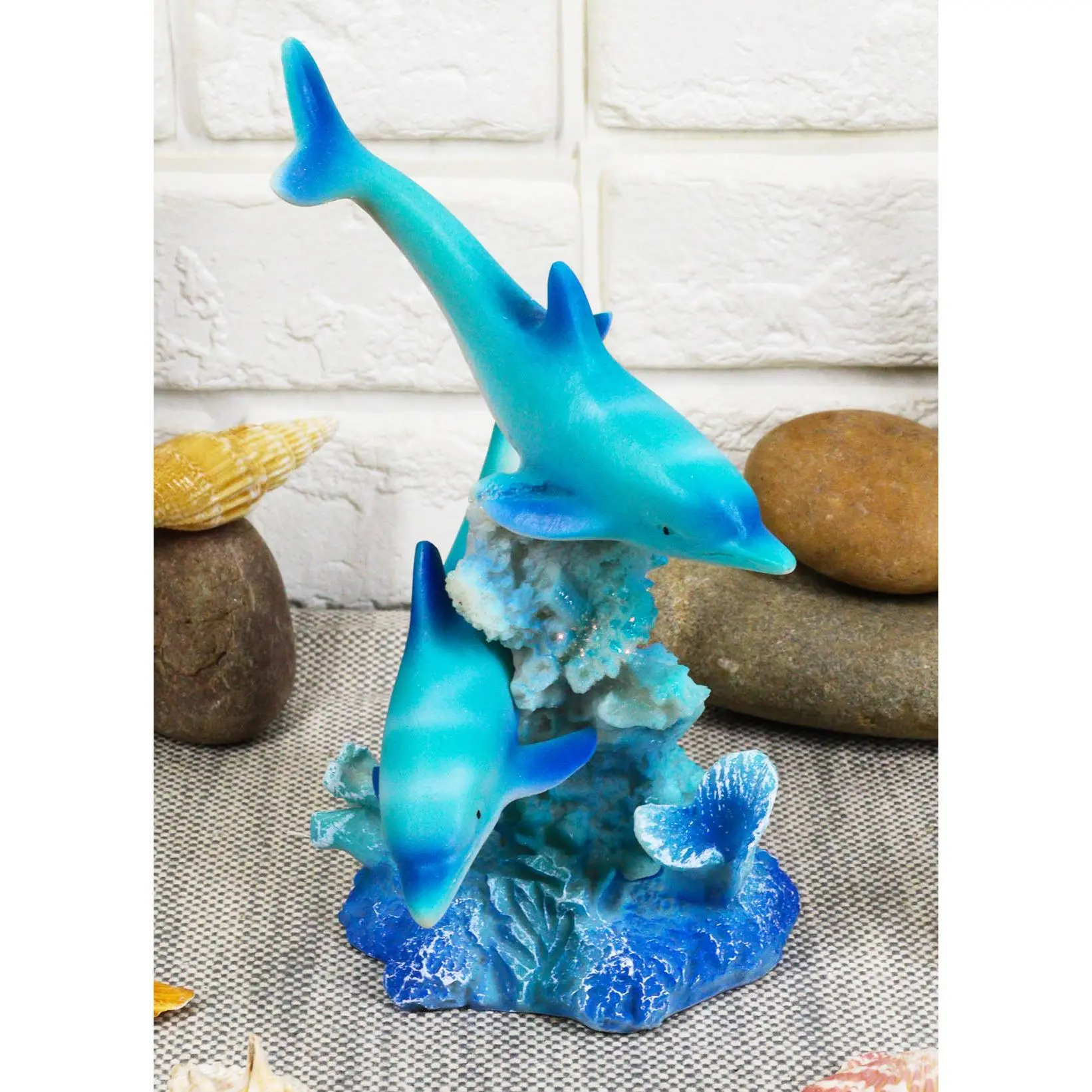 Marine Life Ocean Two Blue Dolphins Swimming Around Coral Reef Statue Sea World