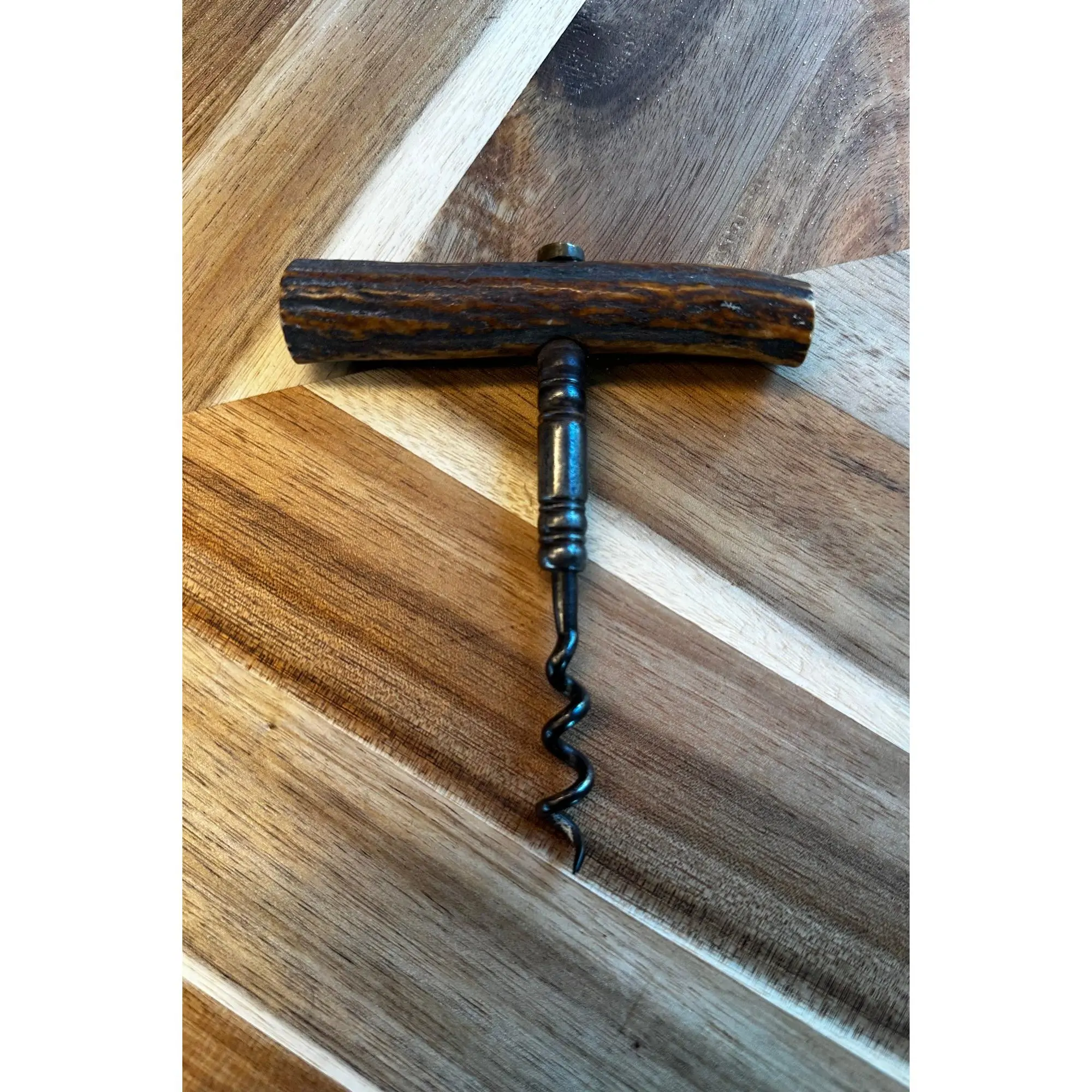Vintage horn-handled corkscrew with steel worm