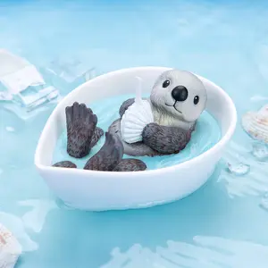 Sea Otter Holding Sea Shell Scented Candle