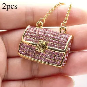 Elegant Rhinestone Mini Handbag Keychain for Women - Gold-tone alloy tote bag charm with lobster clasp, sparkling pink rhinestone clutch design, secure lobster clasp, durable, suitable for both everyday and formal occasions.