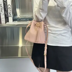 Pre-owned BURBERRY Baby Pink Natural Grain Calfskin TB Logo Drawstring Mini Bucket Bag Gold Hardware Adjustable Matching Leather Crossbody Strap