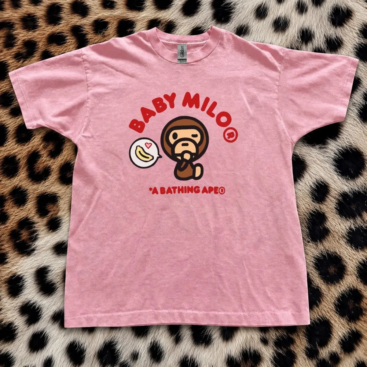 Pink Baby Milo A Bathing Ape cotton t-shirt with brown monkey graphic