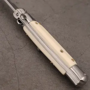 Multifunctional camping knife, milky white handle, stylish design, suitable for daily household use, cutting fruit, and peeling.