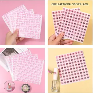 Two pink heart-shaped number stickers, self-adhesive waterproof labels for nail polish bottles, professionally designed for nail technicians or home salon nail tools and nail art supplies.