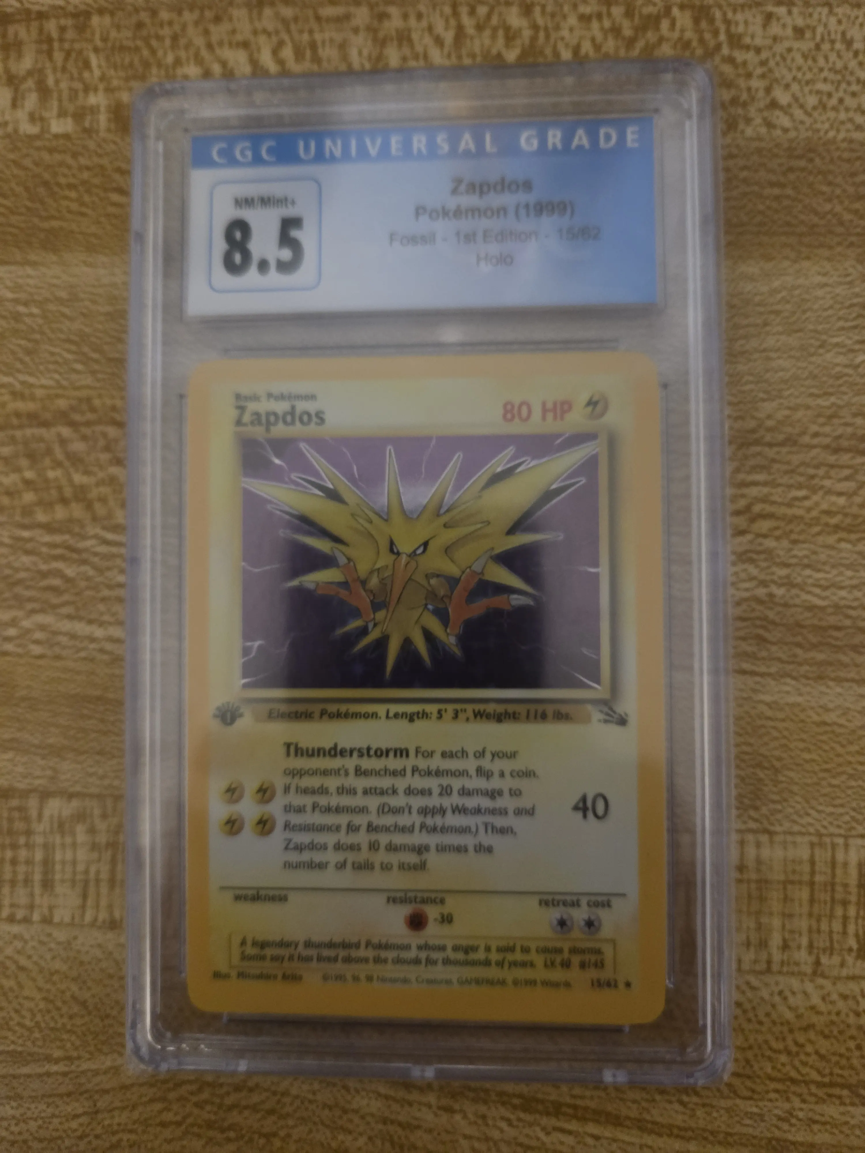 1st Edition Fossil Zapdos Pokemon Card PSA 8.5