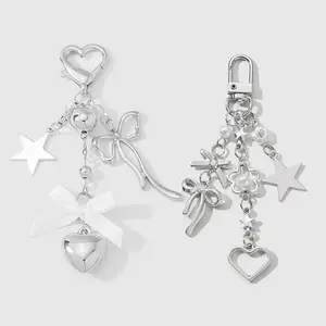 Set of 2 light luxury, minimalist, versatile fashion silver series items featuring bows, CCB heart/star motifs, faux pearls, and flowers; DIY keychain and bag charm combo set; suitable for sisters and best friends’ everyday wear; ideal as a holiday gift.