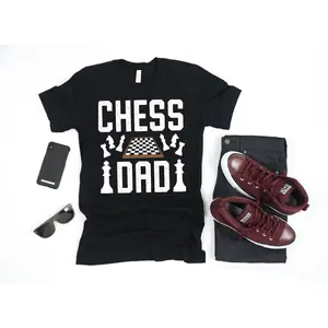 Men's chess-themed father's day apparel Graphic T-Shirt - Short Sleeve Crew Neck Regular Fit Casual Wear | Soft & Breathable Fabric, Durable Print, Everyday Comfort, Machine Washable, casual and flat-lay fashion flat lay product display with accessories