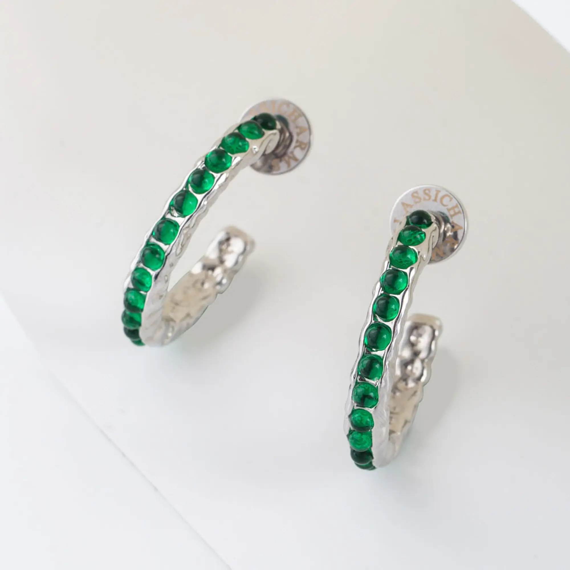 Serena Silver Molten Emerald Gemstone Hoop Earrings - Handmade Rhodium Plated Brass with 3.8cm Hoop Size and Vibrant Emerald Gemstones