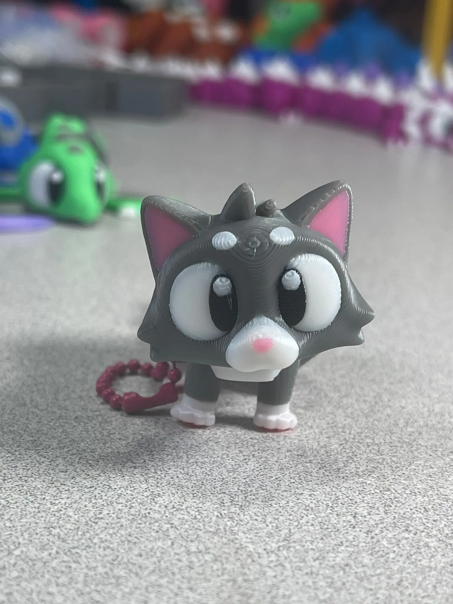 Whimsical Grey Kitty Keychain with Pink Paws