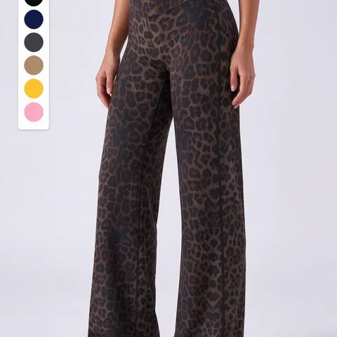 Women’s leopard-print wide-leg long pants with an elastic waistband, fluid drape, and straight cut-casual women’s sports pants available in multiple colors, including solid and printed options for everyday wear.
