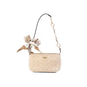 Coach Nolita 19 Silk Knot Messenger Bag for Women – Elegant Classic Monogram Coated Canvas in Sand and Chalk White