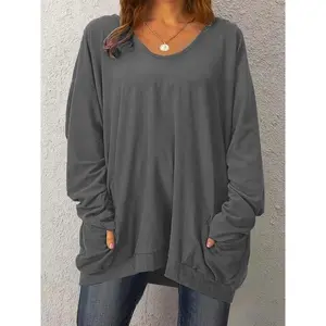 Long sleeved plus size women's casual top with pockets, solid round neck