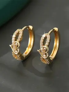 A pair of heart-shaped earrings made of synthetic white crystal, with a stylish, retro gold finish. High Quality Earrings Perfect for wearing on special occasions like weddings or holidays. Stud Earrings Jewelry