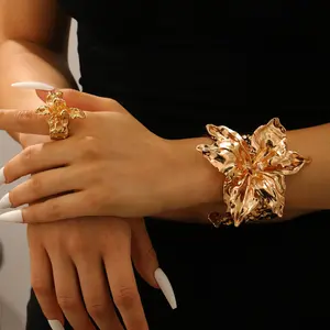 A set of two pieces including a unique design with exaggerated pleats and flowers on the ring and bracelet, suitable for women who value individuality and unique style, showcasing their distinctive temperament through fashionable jewelry.