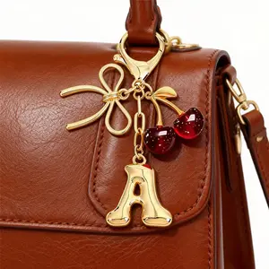 Women's Cherry Bow Keychain Letter Pendant Casual Style Wallet Backpack Accessory Student Handbag Car Key Chain with Stylish Charm
