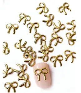 100 Pcs 3D Metal Bow Nail Charms, Hollow Out Bow Tie Nail Art Supplies, Cute Japanese Korean Style Nail Decoration for DIY Salon