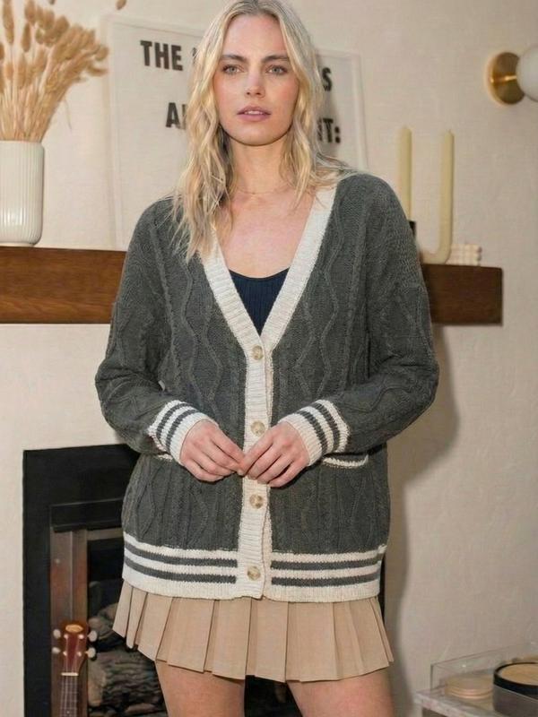 Preppy Cable Knit Varsity Cardigan  Textured cable knit cardigan with contrast varsity-inspired trim.