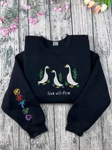 Like All Fire Goose Sweatshirt – The Hunger Games Embroidered Crewneck