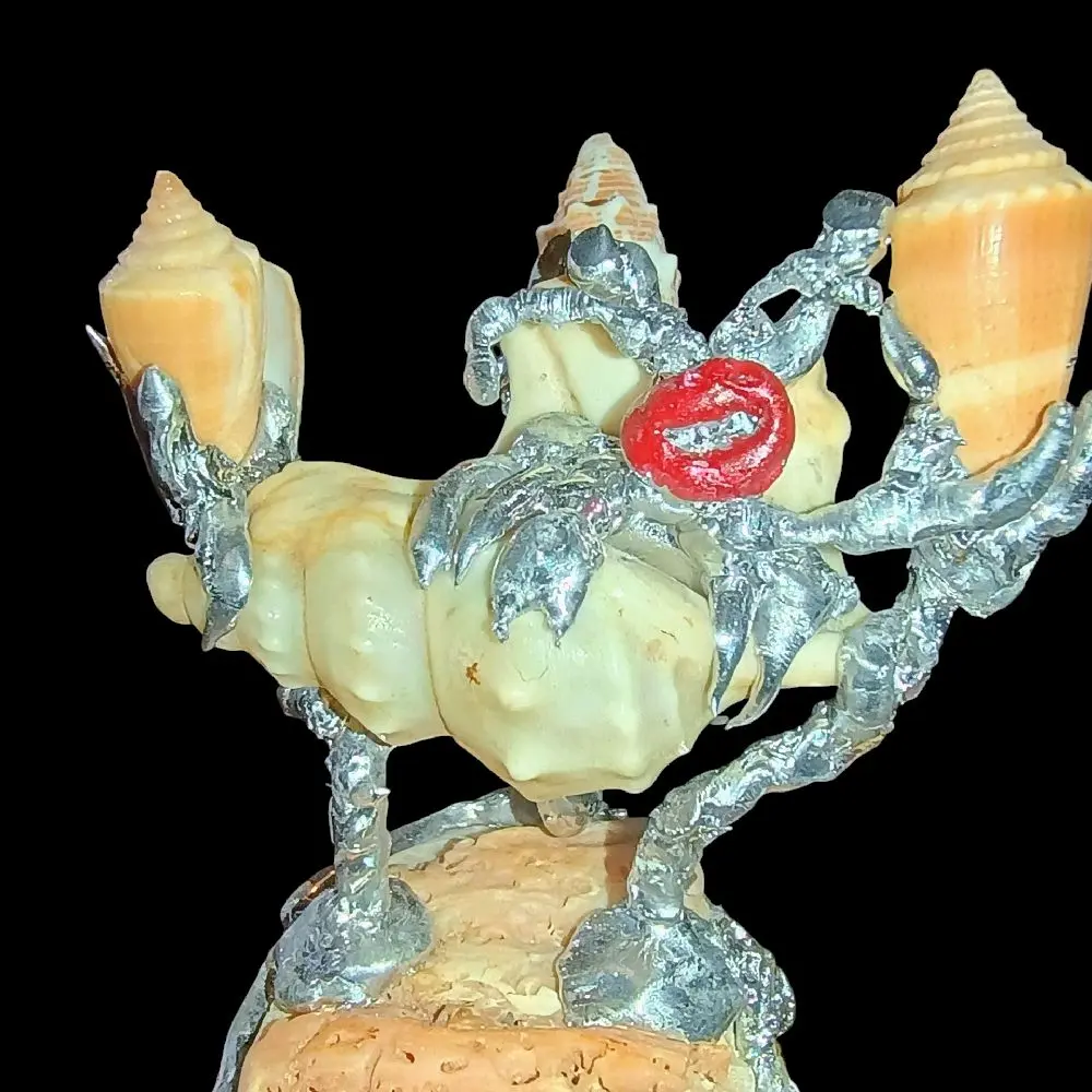 Handmade Sculpture of a Hermit Crab with Unique Red Detail and Intricate Shell Design