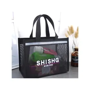 Men’s waterproof mesh shower caddy — portable toiletry bag for travel, swimming, and bathroom essentials like toothbrushes and grooming items.