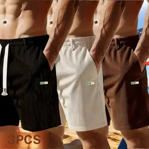 Three piece set of American vintage corduroy casual shorts in black, brown, and cream; minimalist color palette with a drawstring waist and a loose, comfortable fit. Skin friendly, wear resistant, breathable, wrinkle resistant. Suitable for trendy young s