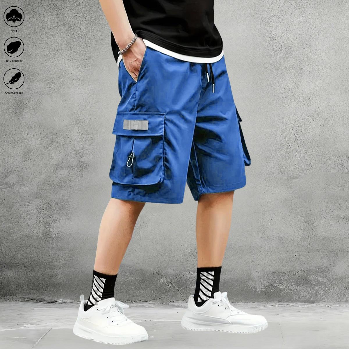 New summer men’s tactical cargo shorts with multiple pockets, made from breathable, quick-dry fabric with slight stretch; suitable for casual outings and travel; elastic drawstring waist for relaxed wear.