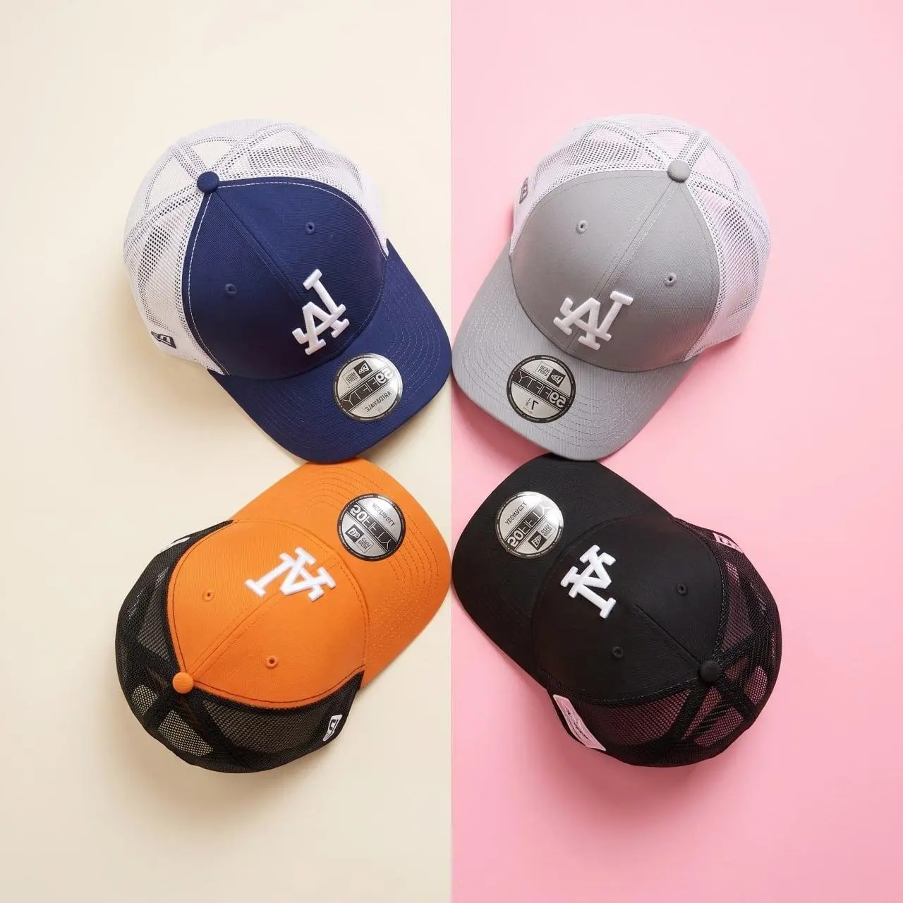 Los Angeles Dodgers Mesh Trucker Hat Split Pastel Flat Lay Display | Curved Brim Breathable Snapback Cap | MLB Baseball Fan Gear Streetwear Apparel