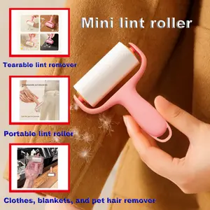 Mini lint roller with tear-off lint paper, portable lint roller for clothes, blankets, and pet hair removal.