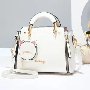 Solid-color cat pendant crossbody bag, new multi-layer handbag