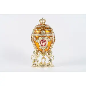 Large orange and gold coronation egg, perfect for decor. An ideal gift for family or friends, it serves as a versatile piece—suitable for trinkets, jewelry, or as a thoughtful man's gift 5"