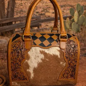 Elegant Cowhide Handbag with Floral Embroidery and Checkerboard Design in Tan and Black