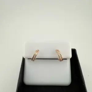 0.09ctw VVS Moissanite Huggie Earrings | Rose Gold Finish | Sterling Silver