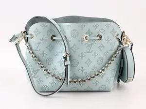 Pre-owned Louis Vuitton Leather Bucket Bag Bella in Mineral Blue with Braided and Metal Handle and Removable Round Coin Purse