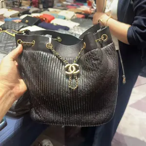 Pre-owned CHANEL H5 Black and Gold Chain Backpack bz051917