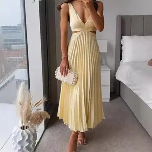 Summer 2025 elegant V-neck sleeveless hollow-out backless pleated dress; backless satin A-line vest dress; women’s formal fit workwear; minimalist basics; yellow