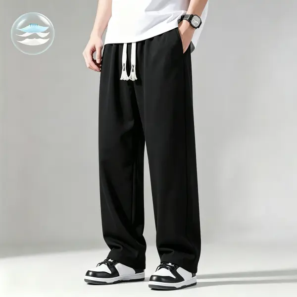Men’s loose straight-leg pants featuring an elastic waistband with tassels and a drawstring; casual wide-leg trousers suitable for streetwear and everyday wear.