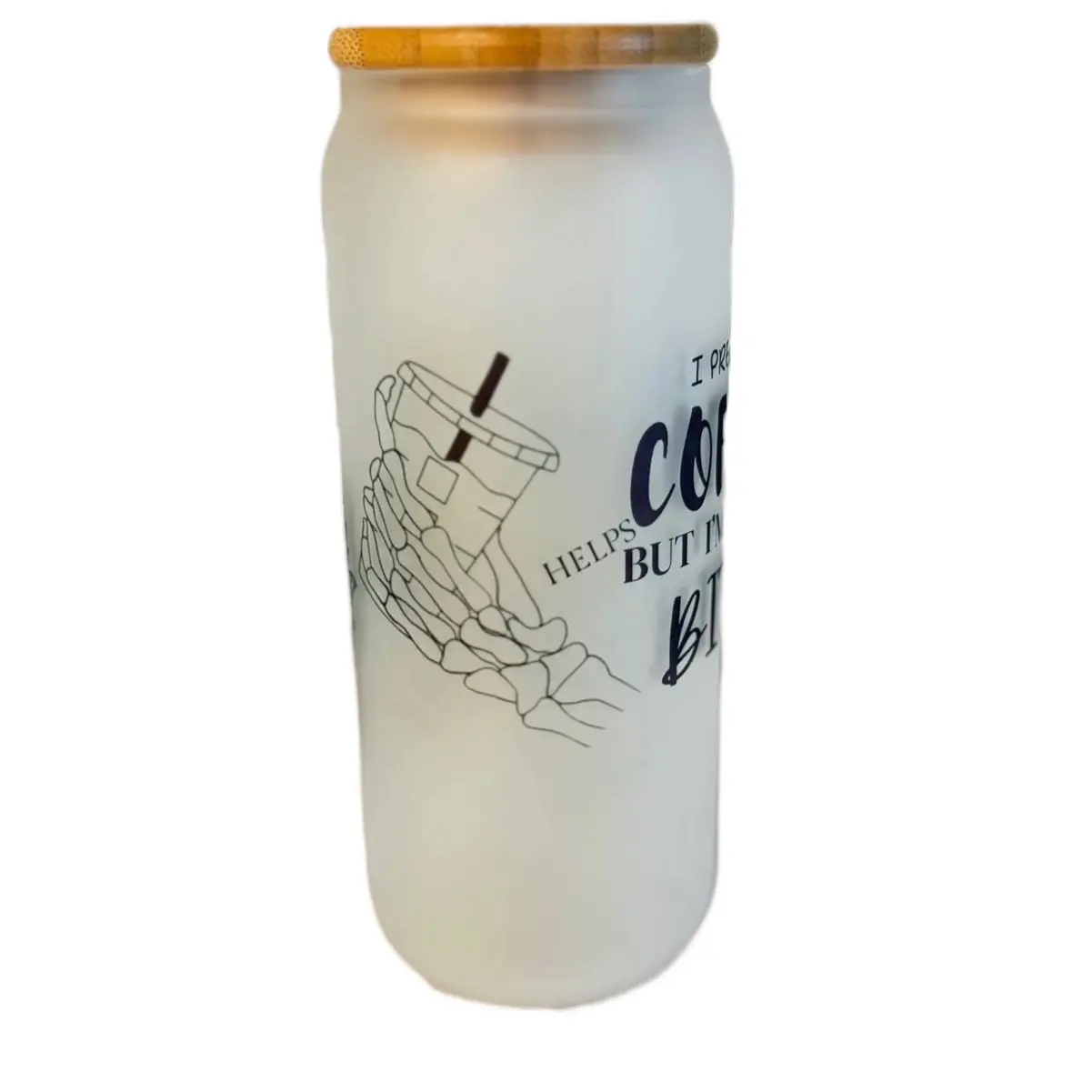 This 16oz frosted glass tumbler is versatile for various beverages. The inscription, 'I pretend coffee helps but I'm still a B,' adds a touch of humor. It has a bamboo lid with a glass straw.