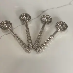 SILVER HAMMERED SPOONS