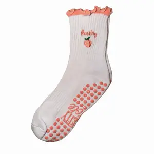 Peach Perfect White Grip Socks with Embroidered Peaches & Bold Orange Grips for Pilates Practice